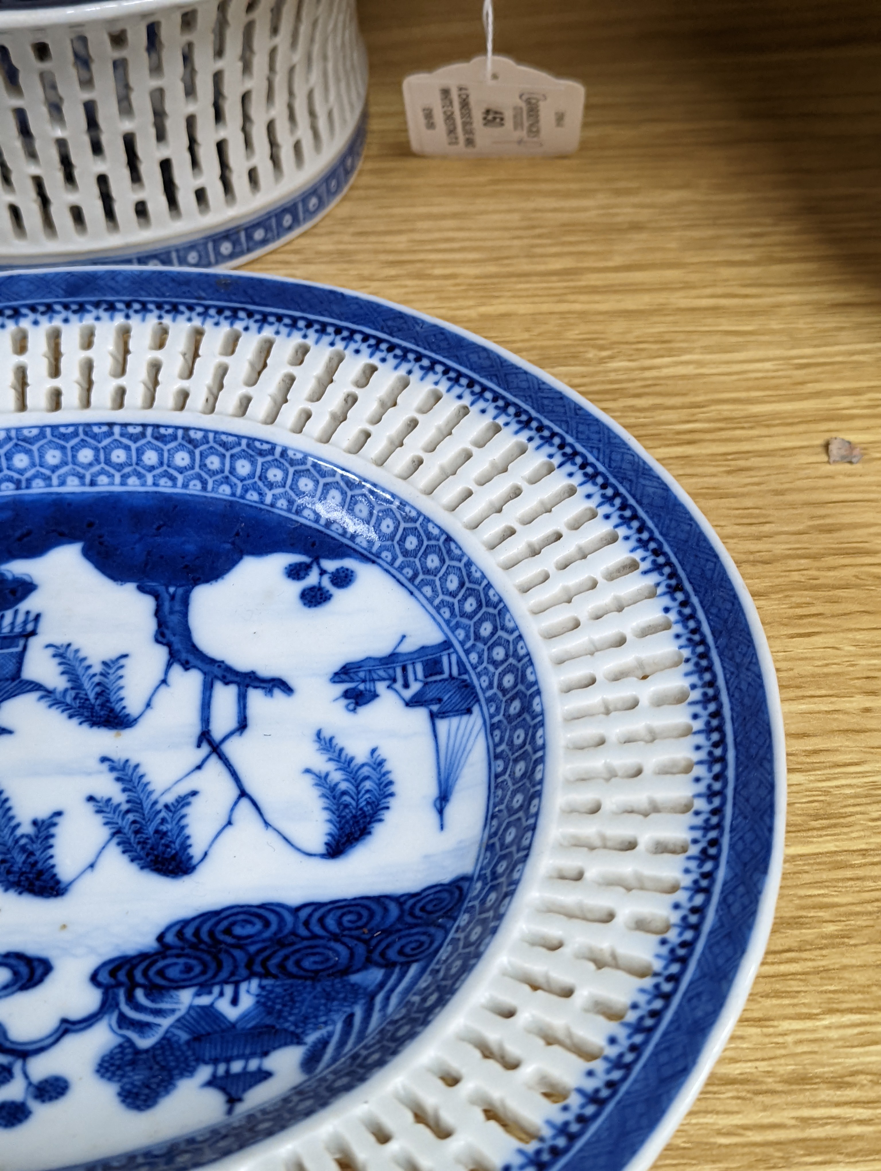 A Chinese blue and white chestnut basket and stand, Qianlong period, basket 11 cms high.
